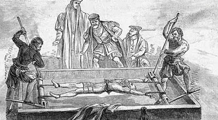 A person being stretched to fit into Procrustes' bed. Tall people had their legs shortened by axe to get them to fit.